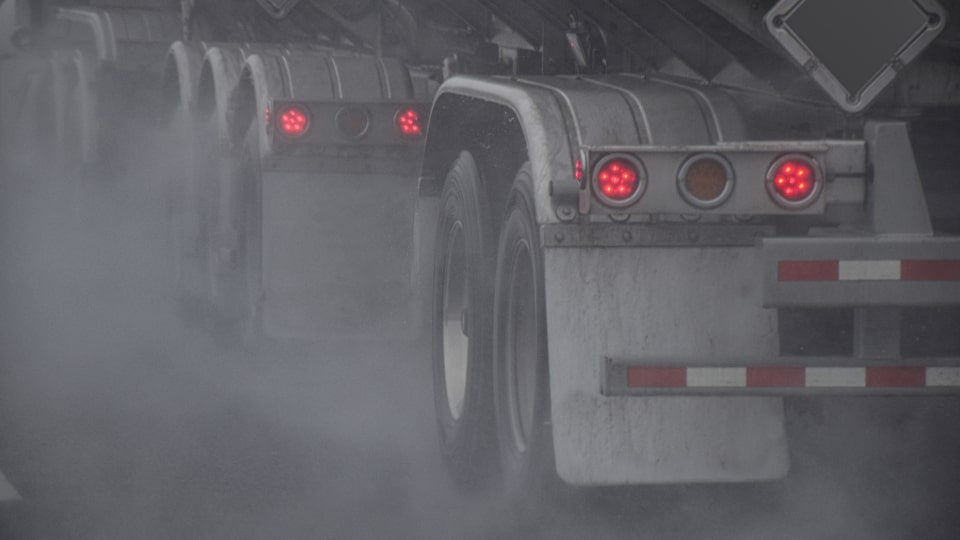 Image of truck producing emission
